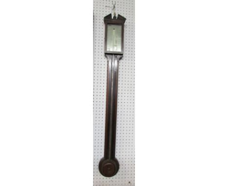 An Edwardian inlaid mahogany stick barometer by Selimanzi of 81 High Hollom, London. The hinged glazed aperture has a thermom