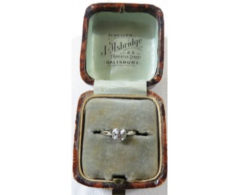 A solitaire diamond ring, the old mine cut stone estimated at 0.6 carat, the shank un-stamped and cut, total weight of ring 1