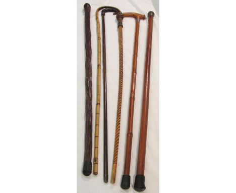 Six walking sticks and canes - hickory shaft with horn handle and white metal collar, a gnarled straight cane, a bamboo cane,