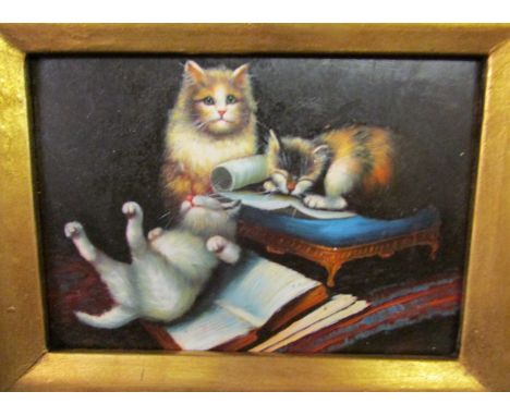 Three cats with cushion and book, colour print with hand embellishments, (11cm x 16cm), in an antique effect frame