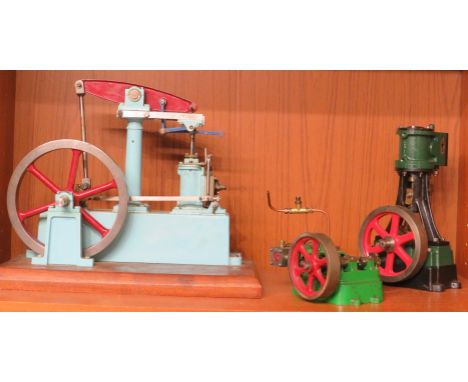 Three cast metal components for model steam engines - a beam engine, and two piston systems