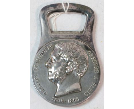 A bottle opener moulded with portrait head and marked CHARLES CHRISTOFLE ORFEVRE A PARIS 1805-1863, FOURNISSEUR DE L'EMPEREUR