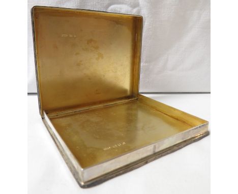 A mid 20th century silver cigarette case, engine turned, engraved with initial R, foliate moulded edge, gilt interior, marks 