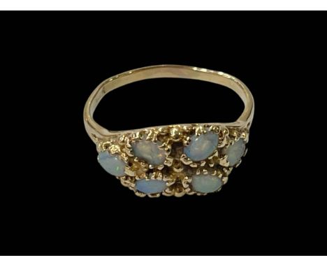 14 carat gold six stone opal ring, size U.