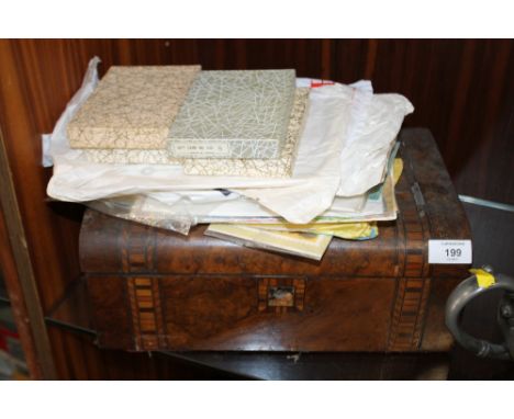 A VINTAGE INLAID WORK BOX AND CONTENTS TO INCLUDE POSTCARDS 