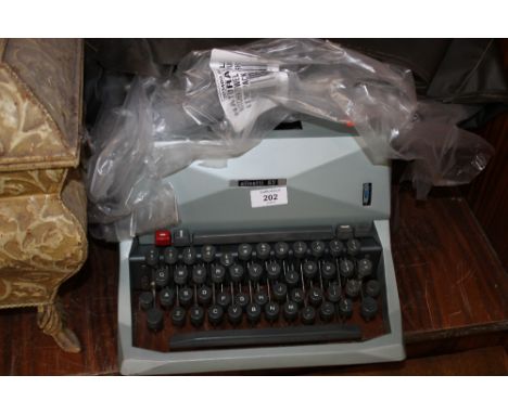 AN OLIVETTI 82 VINTAGE TYPEWRITER 
