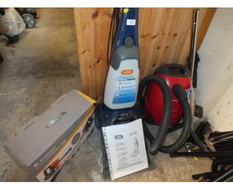 A VAX CARPET WASHER TOGETHER WITH AN ELECTROLUX VACUUM AND A COMPACT VAC