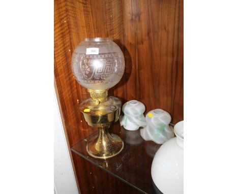 A VINTAGE BRASS OIL LAMP WITH SHADE AND TWO OTHER SHADES 