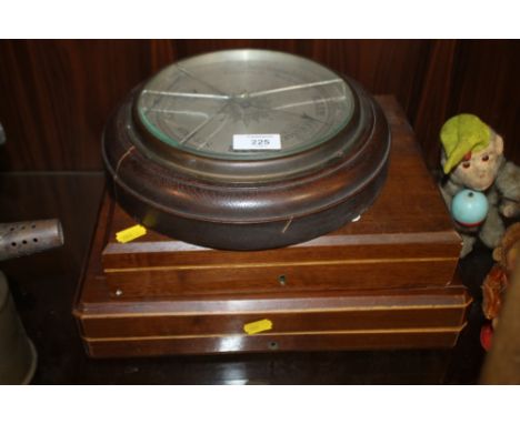TWO FLATWARE BOXES AND CONTENTS TO INCLUDE BONE HANDLED EXAMPLES AND A BAROMETER (3)