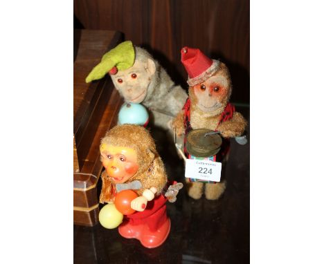 THREE VINTAGE WIND UP MUSICAL MONKEY TOYS