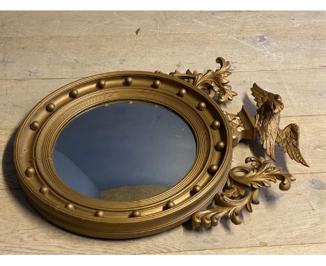 Irish convex circular wall mirror 44 dia, the frame with ball decoration  an eagle finial  with acanthus decoration overal he