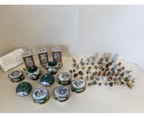 Quantity of Wade Whimsies (approx 42) animals and Lena Liou music boxes with various certificates CONDITION: various chips 