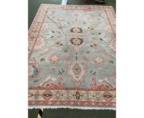 A pretty contemporary rug, in colours of light greens and pastels, in generally good condition&nbsp;&nbsp;240cm W x 311cm L