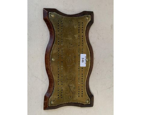 Old brass serpentine shaped Cribbage board 27cm L CONDITION: General wear 