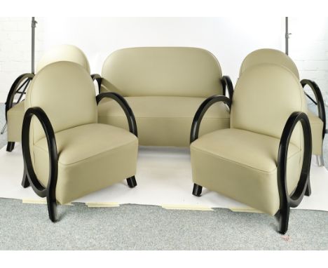 Art Deco-Sitzgruppe, 20. Jh., vier Fauteuils und ein Zweisitzersofa, kreisfömig geschwungene Armlehnen in ebonisiertem Holz, 