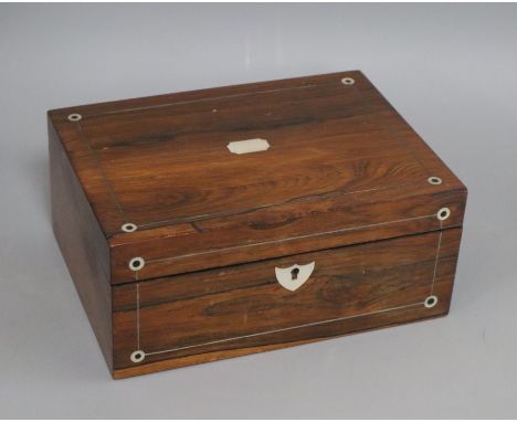A rosewood mother of pearl inlaid sewing box