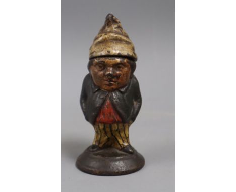 A small antique cast iron painted inkwell, in the form of a dwarf