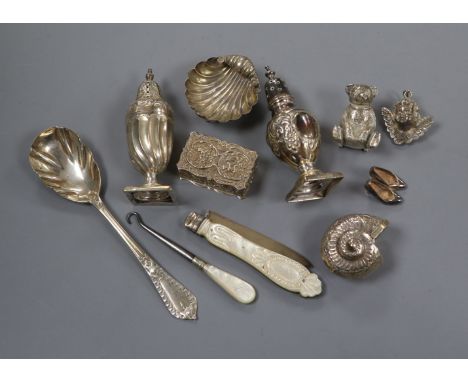 Ten assorted small silver and white metal items including a Victorian pocket fruit knife, two condiments etc. and a button ho