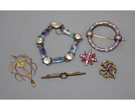 An early 20th century silver, enamel and mother of pearl bracelet, a Victorian yellow metal and two colour enamel target broo
