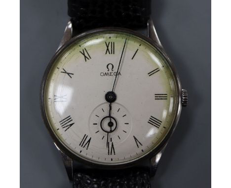 A gentleman's early 1940's Omega manual wind wrist watch, with Roman dial and subsidiary seconds, on later associated leather