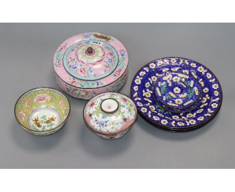 A Chinese Canton enamel brushwasher, two bowls and cover, four plates and three stands, 19th/20th century