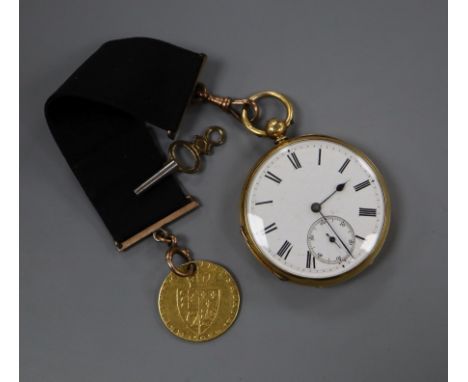 An 18ct gold open face pocket watch, on sash hung with a gold spade guinea(worn).