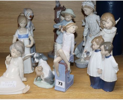 Thirteen Lladro and Nao porcelain figures