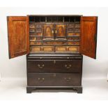 AN 18TH CENTURY "VARGUENO" IN A GEORGE III LINEN PRESS, the earlier part comprising numerous