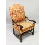 A 17TH CENTURY ITALIAN CARVED WALNUT ARMCHAIR with padded back and seat, with carved arms and barley