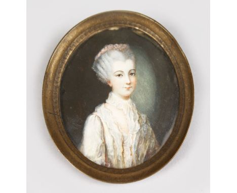 AN OVAL MINIATURE, A 19TH CENTURY PORTRAIT IF A MAN. 2.5ins x 2ins.