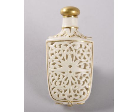 A GRAINGERS WORCESTER "IVORY" PORCELAIN PIERCED SCENT BOTTLE, CIRCA. 1875, with gilt stopper.  8cms high. See Launet, Figure 