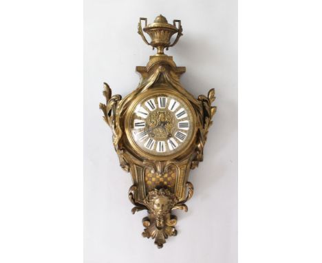 A VERY GOOD 19TH CENTURY FRENCH BRONZE CARTEL CLOCK, signed H. H. LUPPENS, with black and white Roman numerals, urn finial an