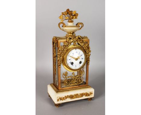 A GOOD 19TH CENTURY FRENCH MARBLE AND ORMOLU CLOCK, with eight-day movement, circular enamel dial, blue and white Roman numer