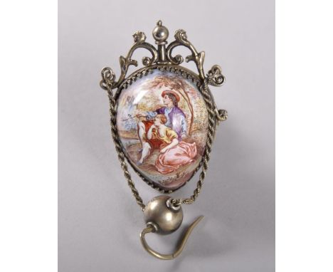 A SUPERB VIENNA ENAMEL PERFUME BOTTLE COMBINED ON A CHAIN, decorated with figures in a garden, opening to reveal a silver gil
