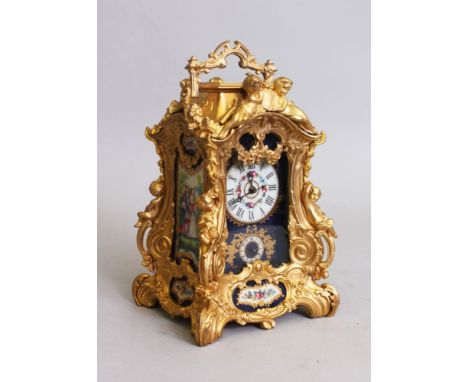 A SEVRES DESIGN FRENCH REPEATER CLOCK. with painted porcelain panels and cupid mounts. 9ins high.