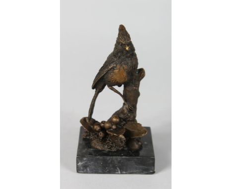 MILO A SMALL BRONZE OF A PARAKEET. 5ins high.  Signed, on a marble base.