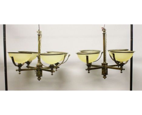 A GOOD PAIR OF LATE 19TH CENTURY FRENCH BRONZE FOUR BRANCH CHANDELIERS, each with frosted glass bowl shaped shades. 2ft 4ins 