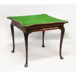 A GEORGE II MAHOGANY CONCERTINA FOLD-OVER CARD TABLE, with later grained decoration, the shaped,