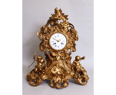 A GOOD LARGE 19TH CENTURY FRENCH LOUIS XVI DESIGN CLOCK, with blue and white dial, Roman numerals, in a case with scrolls, bi