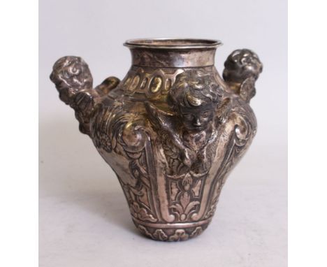 AN ANTIQUE SILVER FRENCH SANCTUARY LAMP with three cast angels head and scrolls. 8ins high.