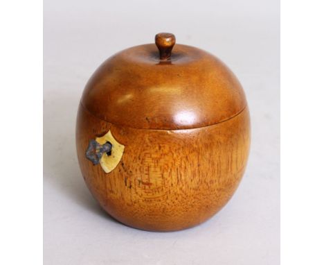 AN ORANGE WOOD TEA CADDY. 5ins high.