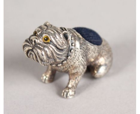 A NOVELTY SILVER BULLDOG PIN CUSHION.