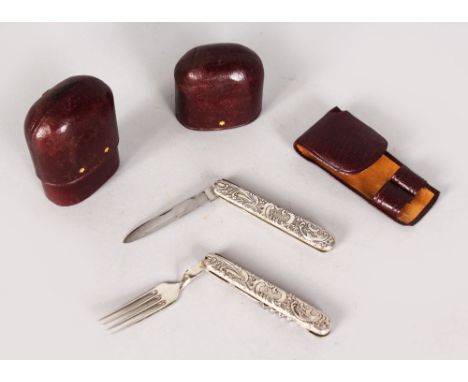 A FOLDING KNIFE AND FORK in a leather case.