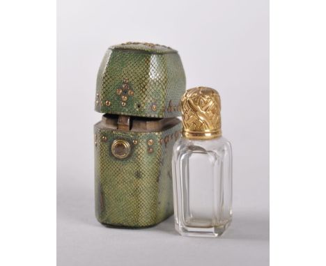 A LATE 18TH CENTURY ENGLISH PERFUME BOTTLE with gold top, contained in a miniature shagreen case with gold studs,  4.5cms. Pr