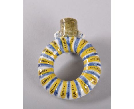 A PRATTWARE DOUGHNUT SHAPED PERFUME BOTTLE with blue, yellow and white decoration and green neck, Circa. 1790. Provenance: NI