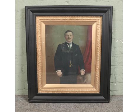 A large framed oil on canvas, portrait of a suited gentleman. 53cm x 40cm.  