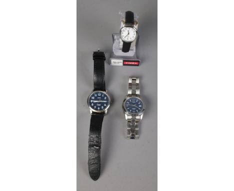 Three Timex Indiglo wristwatches to include day date example and one with stainless steel strap.  