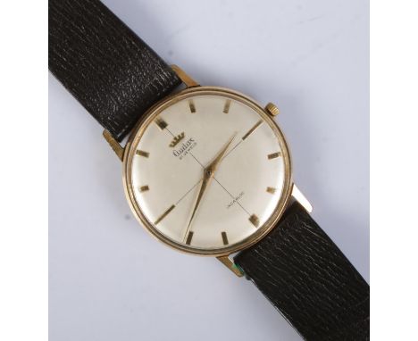 A gents gold plated Audax manual wristwatch.  Working. Small crack to edge of glass.