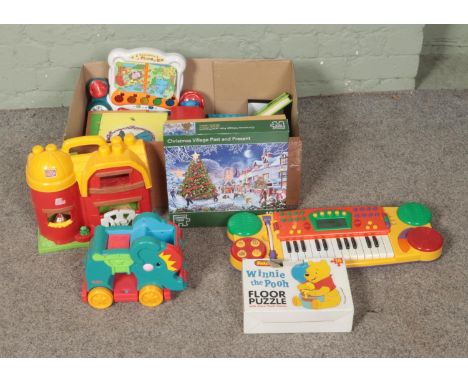 A box of assorted children's toys to include Mega Bloks, Magic Keyboard, Winnie the Pooh jigsaw puzzle, etc.  