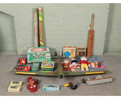 Two boxes of assorted items, mainly vintage games. To include Subbuteo, Rupert bears, model plane (for repair), Pac-Man lunch